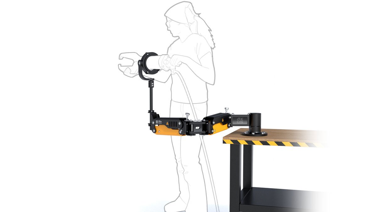 rxos-tool-arm-rendering-industrial-design-arm-on-table-in-use
