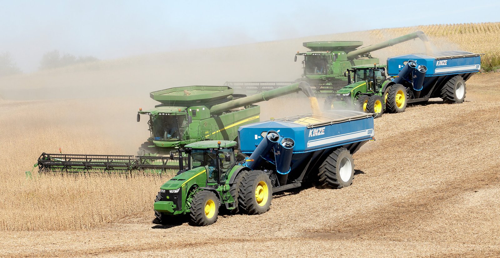 Two Kinze Grain Carts harvesting crops | Industrial Product Design | ROBRADY